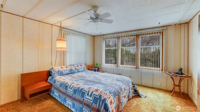 Large primary bedroom with deep closets and huge attached bathroom