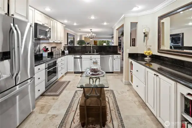 Kitchen is very spacious and easy to work in - enjoy the view from your kitchen sink, too.