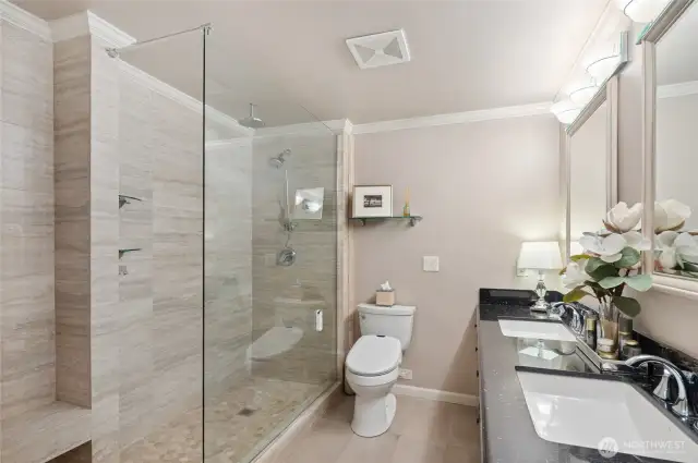 Primary bath has walk-in shower, granite counters.