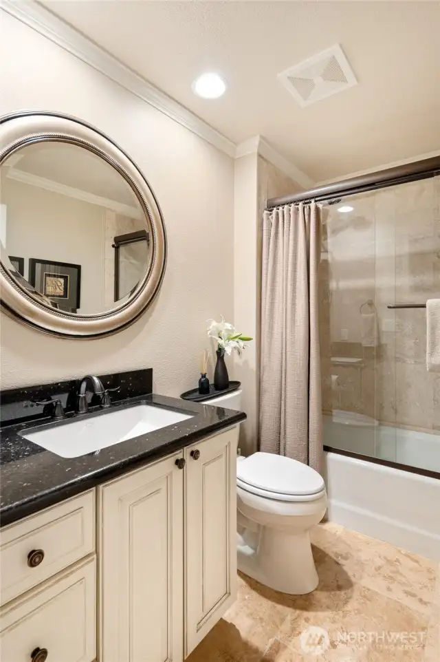 Guest bath with shower/tub.