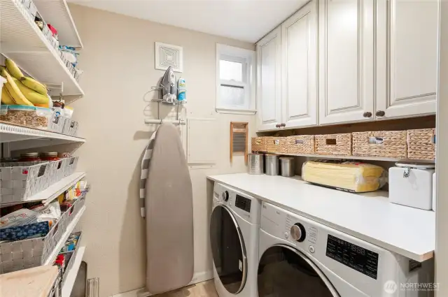 Pantry and utility room thru french doors off the kitchen.