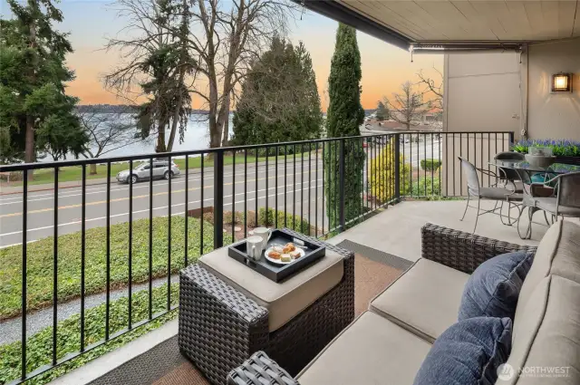 Outdoor living area that is perfect for entertaining.  Remote shades, too.