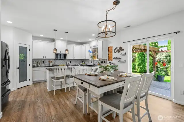 Updated open kitchen with shared dining