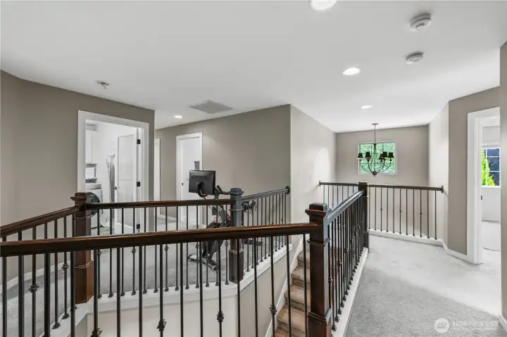 Open staircase helps upstairs feel bright and spacious