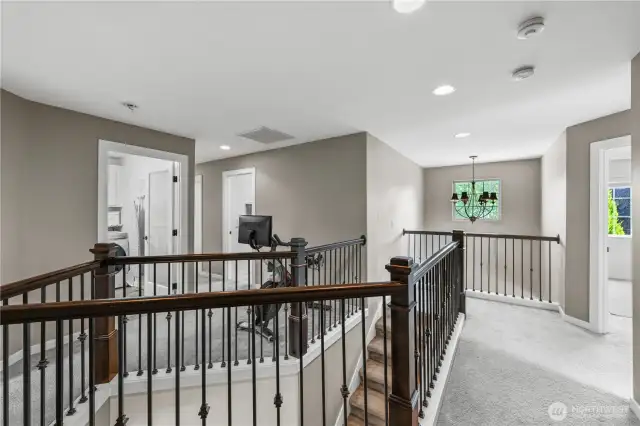 Open staircase helps upstairs feel bright and spacious