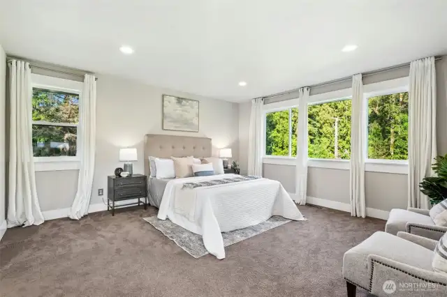 Spacious primary bedroom with ensuite bath
