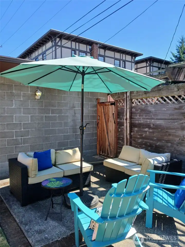 Enjoy the patio area in the full fenced common area