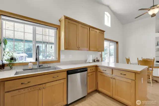 The sink overlooks the back deck and private back yard.