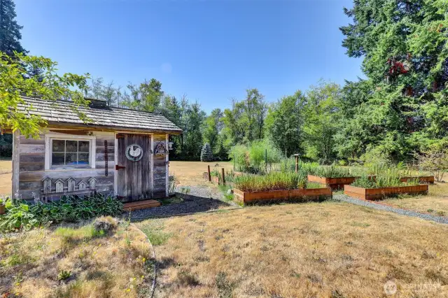 Garden space + the cutest little shed.