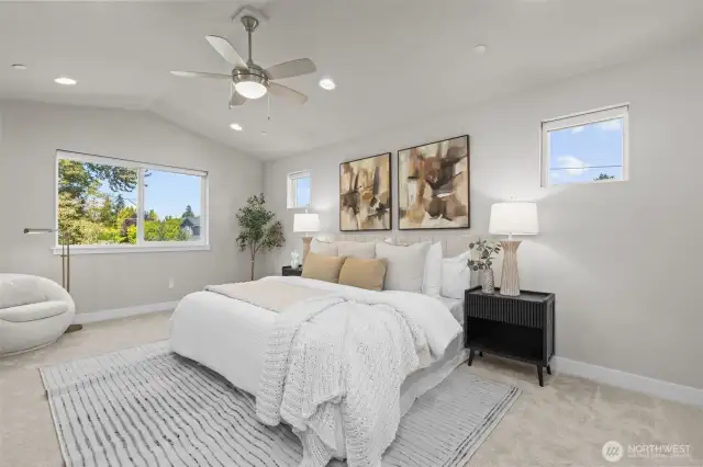 Primary suite with vaulted ceilings