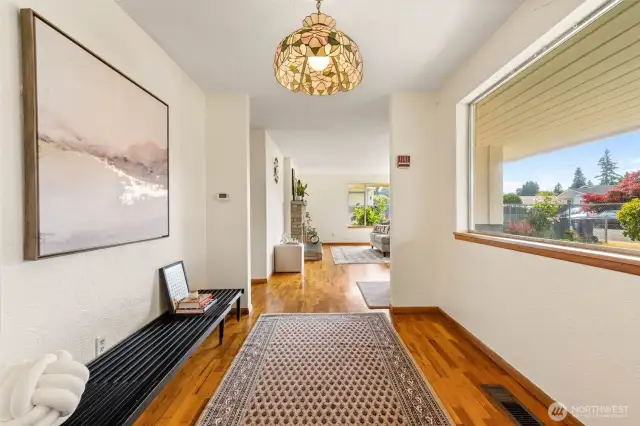 Large windows flood the living area with natural light.