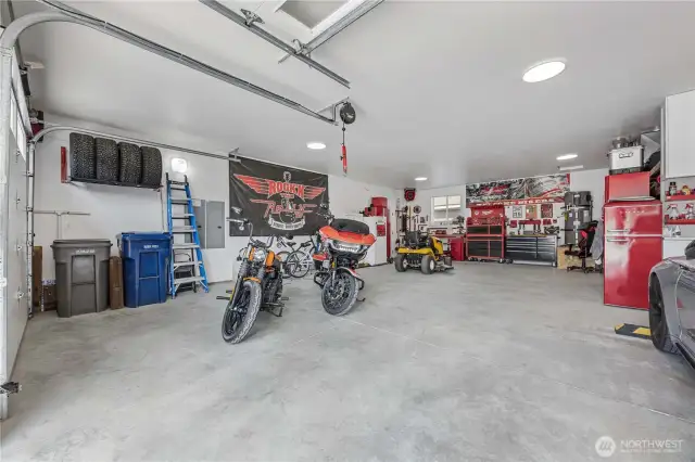 The garage is over 1,000 sqft, with ample storage for eveyrthing.