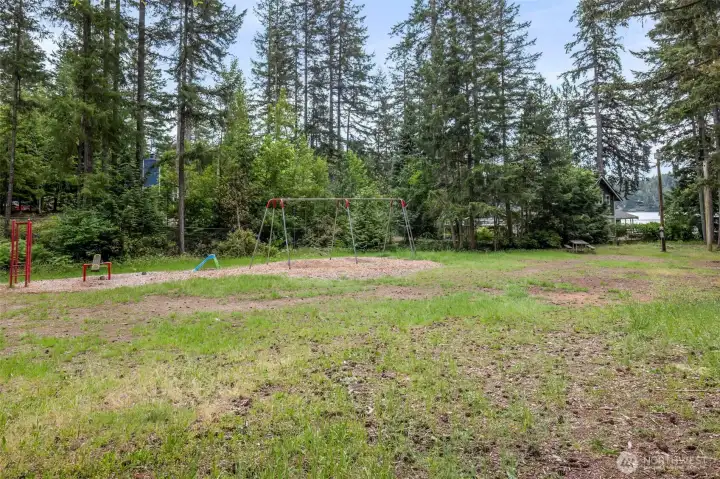 Expansive property with mature trees.