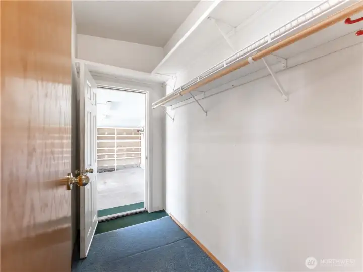 Primary Bedroom Walk-In Closet with Garage Access.