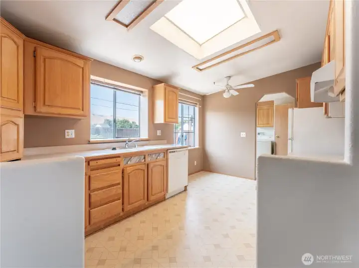Sun Filled Spacious Kitchen with Skylight.