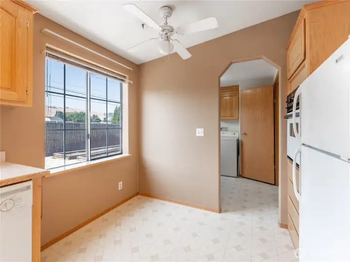 Light and Bright Kitchen with Eating Area That Looks Out to the Back Yard.