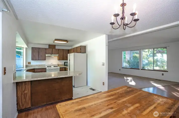 Dining area seamlessly open to both the living room and kitchen.