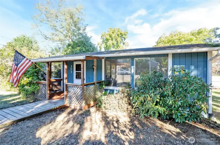 A convenient, ramped entry ensures easy, stair-free access to the home.