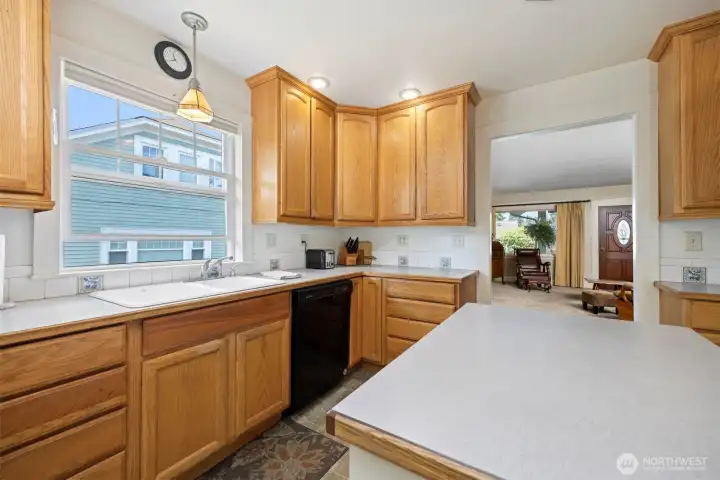 There is an abundance of cabinet and counter space in the kitchen.