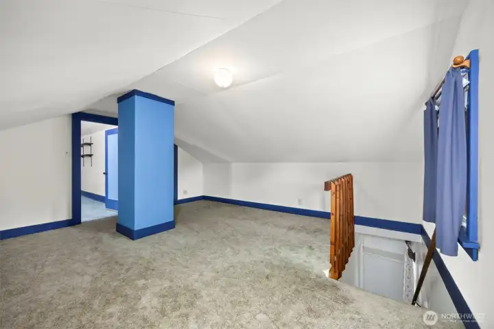 There is one bonified bedroom upstairs with space for another bedroom in the front.
