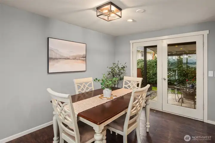 Dining space with French doors to the covered patio out back
