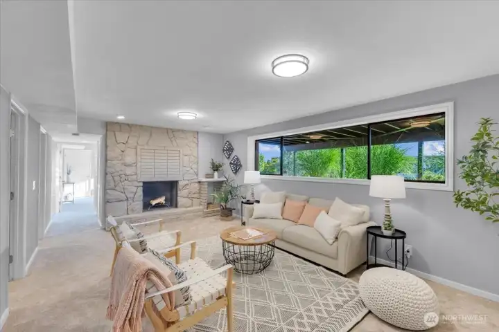 Lower level family room with cozy fireplace