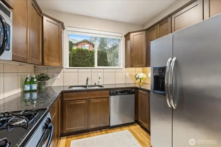 Warm woods and stainless appliances