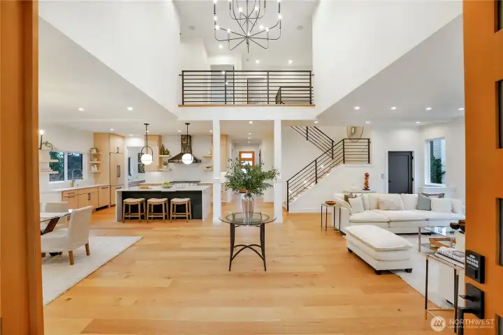 Self-lowering chandelier for changing light bulbs