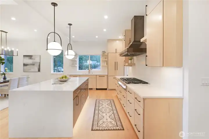 Refined kitchen cabinetry with seamless integrated appliances