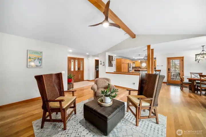 Living room towards kitchen and dining room.