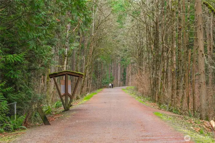 Home backs up to the Cedar River Trail/aboretum and disc golf course.