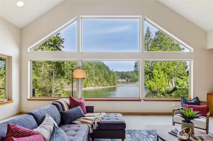 Enjoy the ever-changing views of sea, sky and wildlife from this peaceful waterfront home!