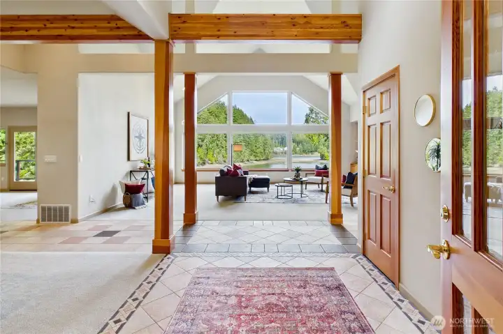 The light-filled entry invites you in while drawing your attention to the stunning views beyond.