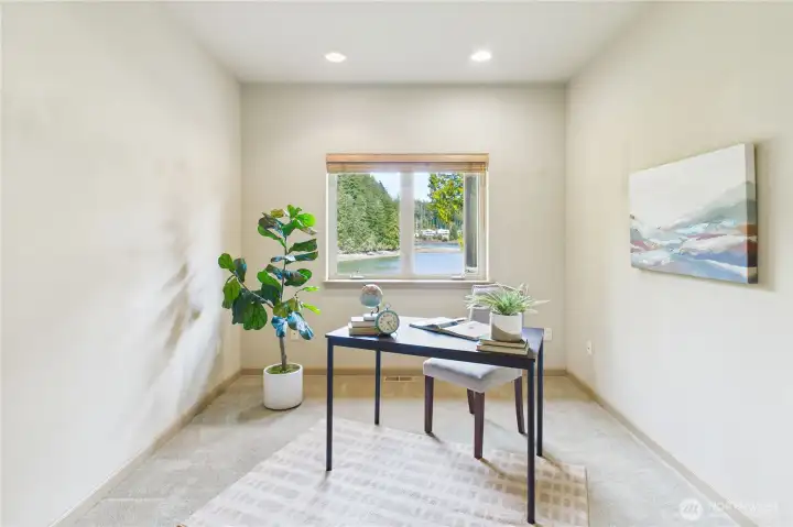 A perfect den, office or library space with views of the bay.