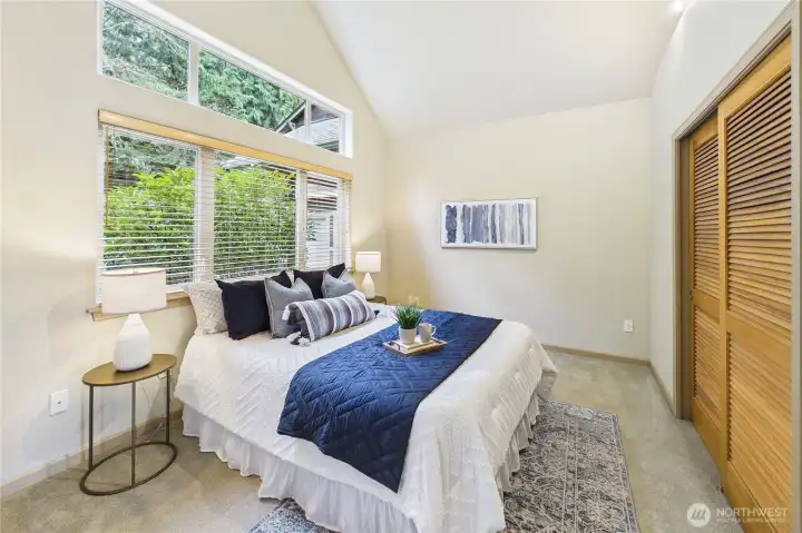 Also on the main floor is a second bedroom suite with vaulted ceilings and tons of daylight.