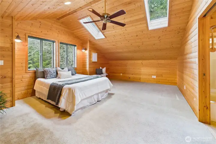 Bedroom #2 above the garage. When touring, note the extensive unfinished storage space that opens into this room, perfect for converting to closet or finished storage space.