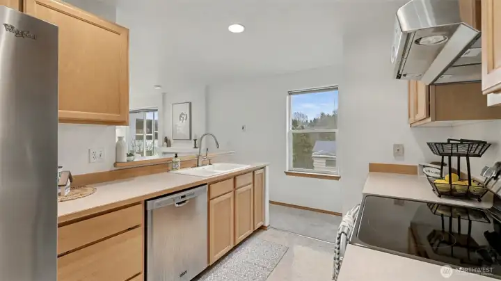 Functional kitchen layout with ample counter space and natural light.