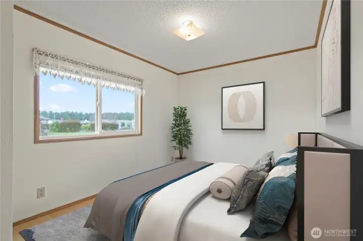 Virtually staged bedroom 1.