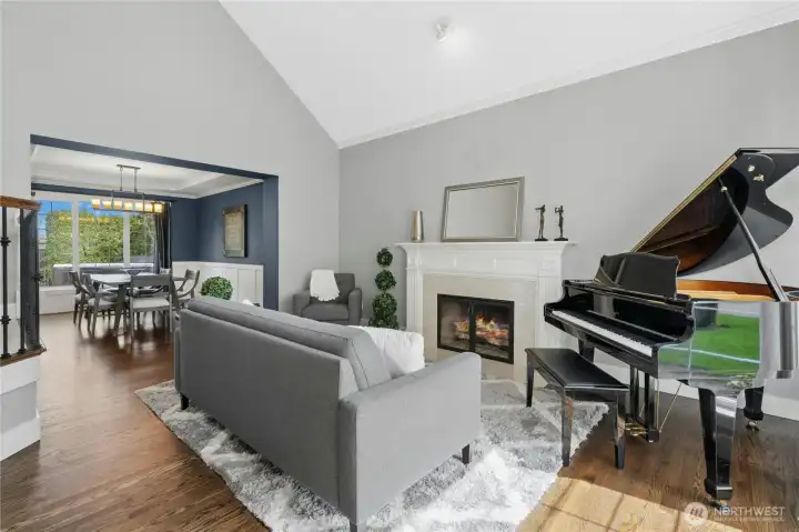 Rich hardwoods on first floor & Living Room with Gas Fireplace