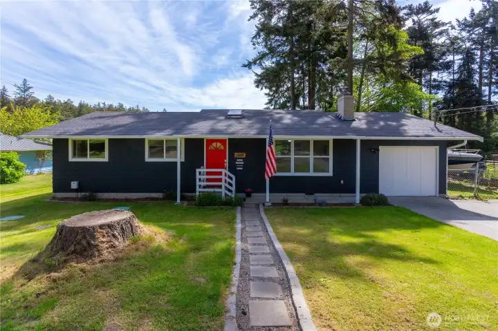 Front of home with paver walkway