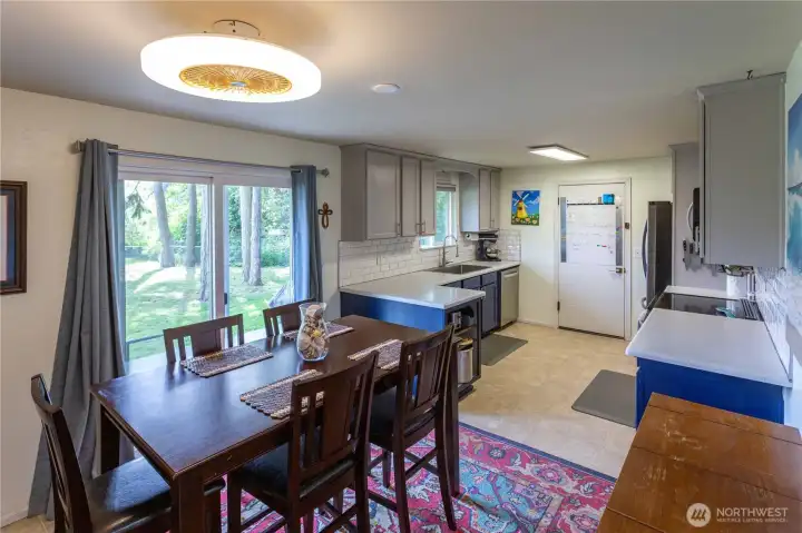 Dining area w/ slider to rear patio/yard