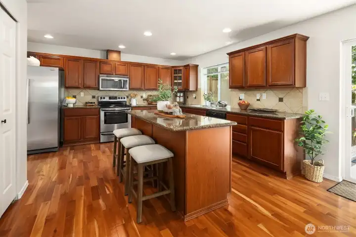 Incredible entertainment sized kitchen w/eating space and deck access