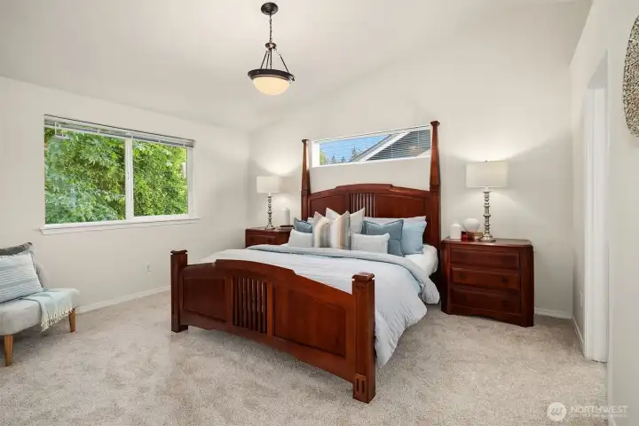 Primary suite with vaulted ceilings and 5-piece ensuite