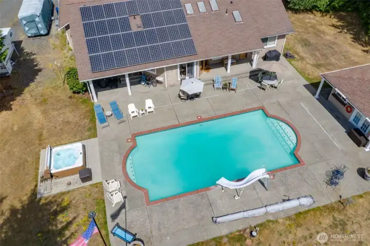 Large in-ground pool and hot tub all on a huge patio, perfect for entertaining!