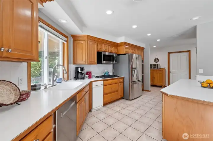 Large kitchen with tile floors.