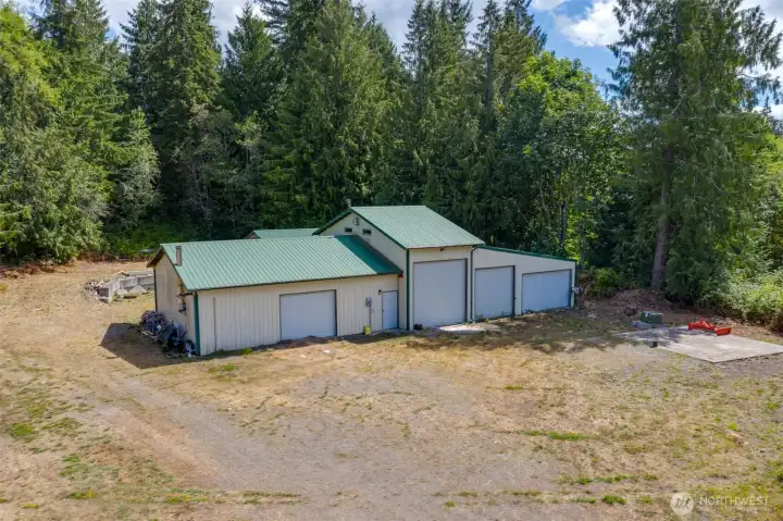 Huge shop with loft and covered  RV parking in back.