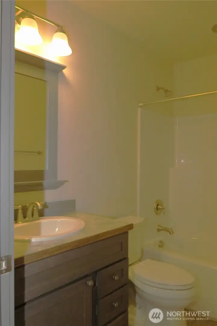 The full guest bath is centrally located between the bedrooms for convenience! The full guest bath is centrally located between the bedrooms for convenience!
