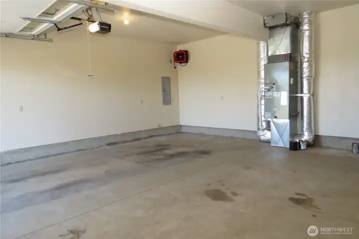 The garage has an electric vehicle charging station and enough room to store your beach and outdoor gear! The garage has an electric vehicle charging station and enough room to store your beach and outdoor gear!