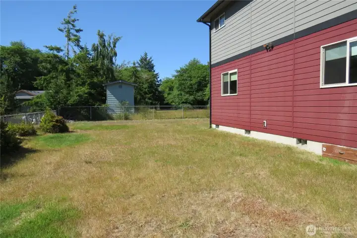 The yard is fenced on three sides and can easily be fully enclosed if desired! The yard is fenced on three sides and can easily be fully enclosed if desired!