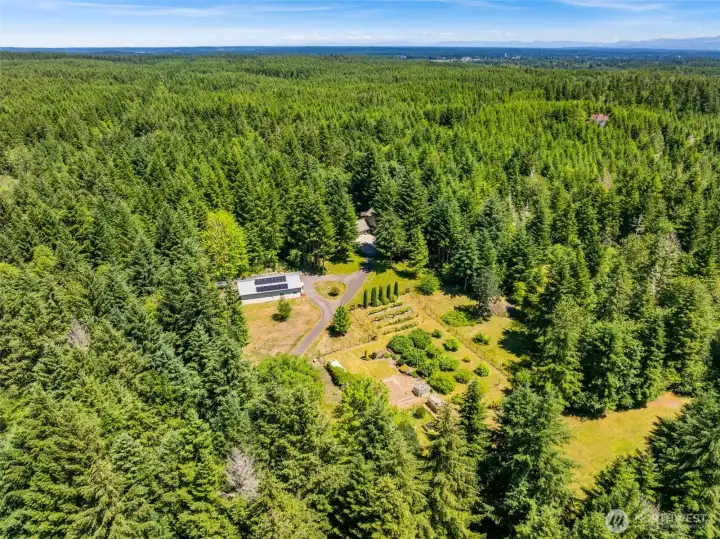 Down the half mile asphalt driveway is the nearly 40 acres of privacy!
